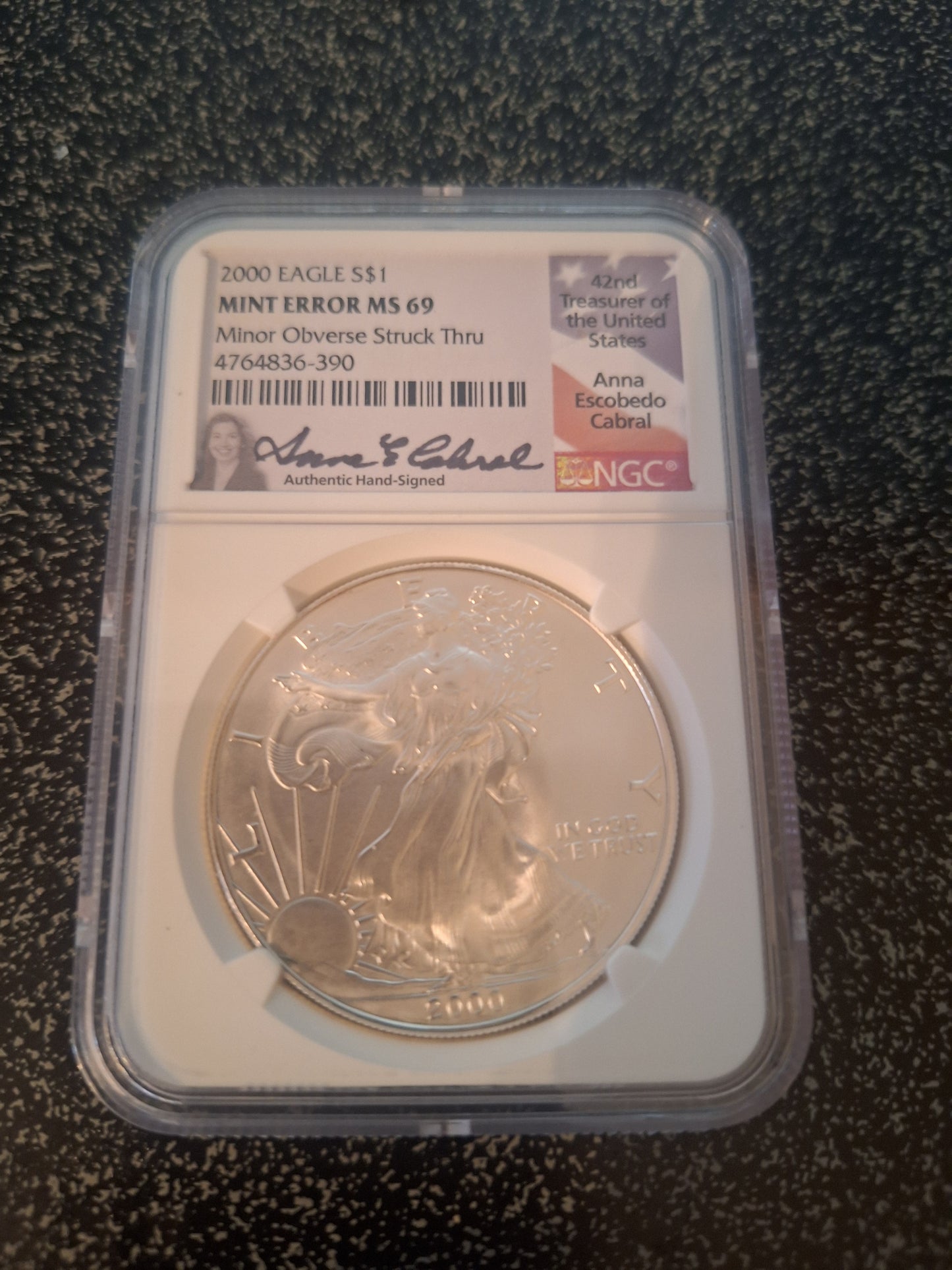 2000 SILVER EAGLE MS69 MINT ERROR OBVERSE STRUCK THRU SIGNED BY ANNA CABRAL NGC