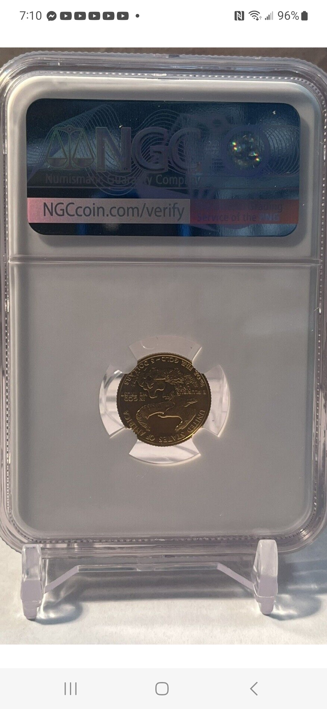 1986 $5 1/10th OZ AGE MS69 MINT ERROR OBVERSE STRUCK THRU NGC "FIRST YEAR OF ISSUE"