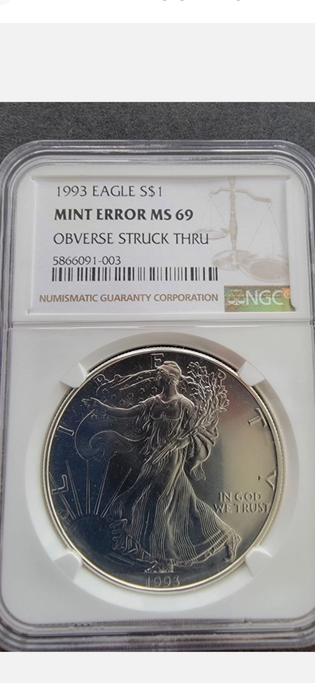 1993 $1 AMERICAN SILVER EAGLE MS69 MINT ERROR OBVERSE STRUCK THRU NGC